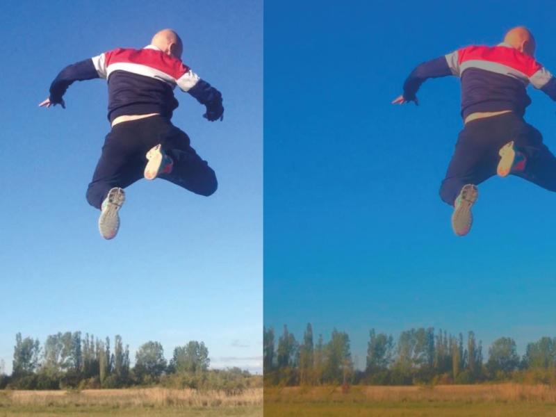 En mand springer højt og er fanget af kameraet mens han er i luften